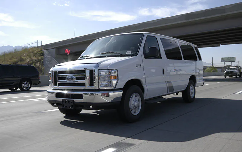 A UTA Vanpool driving on a highway.