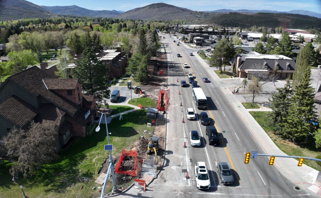 Construction on SR-224, with cones blocking a right turn lane for road widening work.